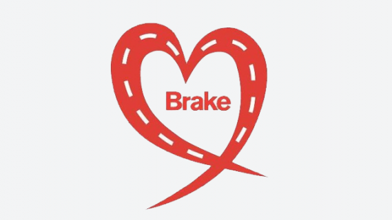 Brake logo. "Brake" in red text inside a red heart outline. The heart has dashed lines similar to those on a road.